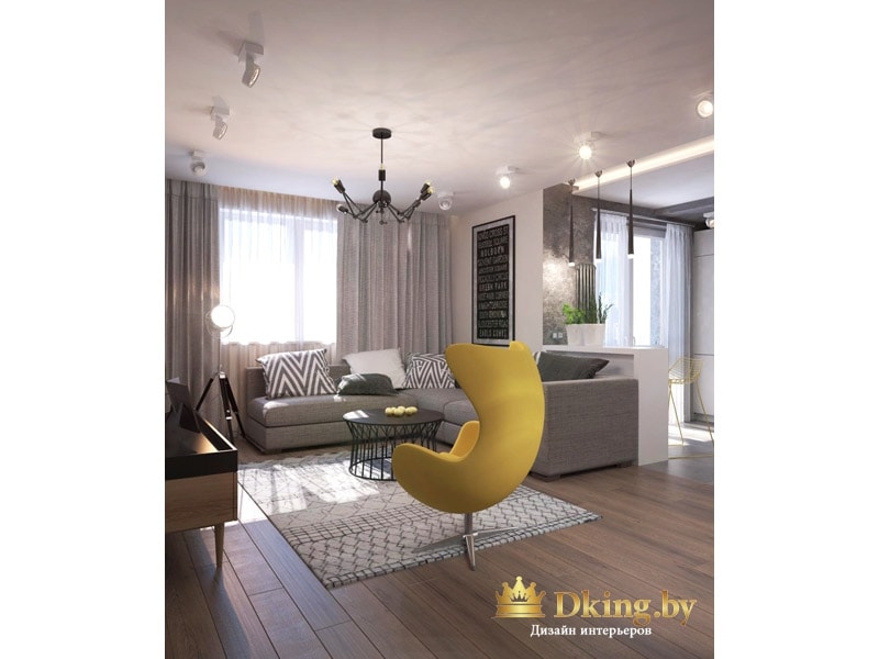 гостиная зона: акцентное желтое дизайнерское кресло на одной ножке, серый угловой диван